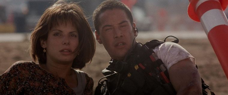 Keanu Reeves y Sandra Bullock en Speed (1994) su primer trabajo juntos.