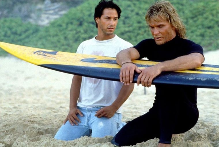 Keanu Reeves y Patrick Swayze en la aclamada película de acción de 1991. Keanu Reeves y Patrick Swayze en la aclamada película de acción de 1991.