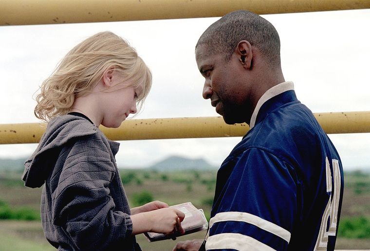 Denzel Washington y Dakota Fanning en Hombre en llamas.