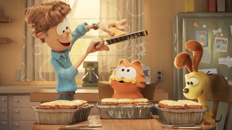 John, Garfield y Odie a punto disfrutar el plato favorito del felino