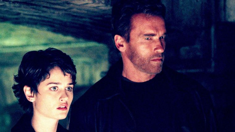 Arnold Schwarzenegger y Robin Tunney en El Día Final. Arnold Schwarzenegger y Robin Tunney en El Día Final.