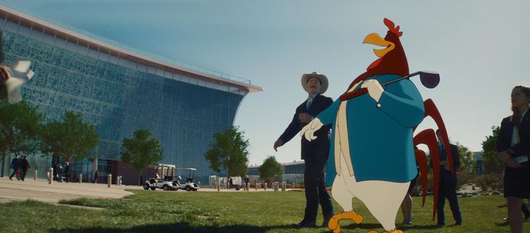 John Cena junto al Gallo Claudio (Foghorn Leghorn), quien al parecer es un importante ejecutivo de la ACME. John Cena junto al Gallo Claudio (Foghorn Leghorn), quien al parecer es un importante ejecutivo de la ACME.